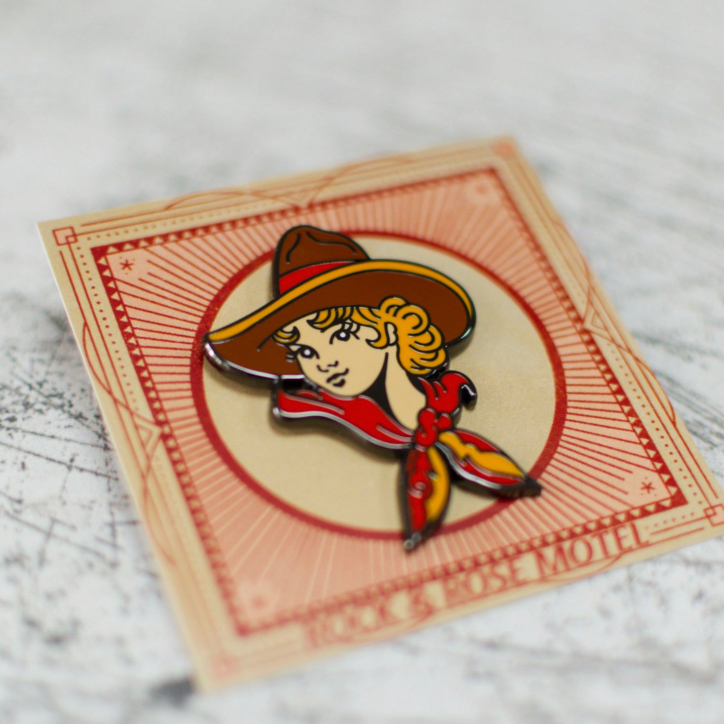 American Traditional Cowgirl Enamel Pin in Packaging Close Up Shot