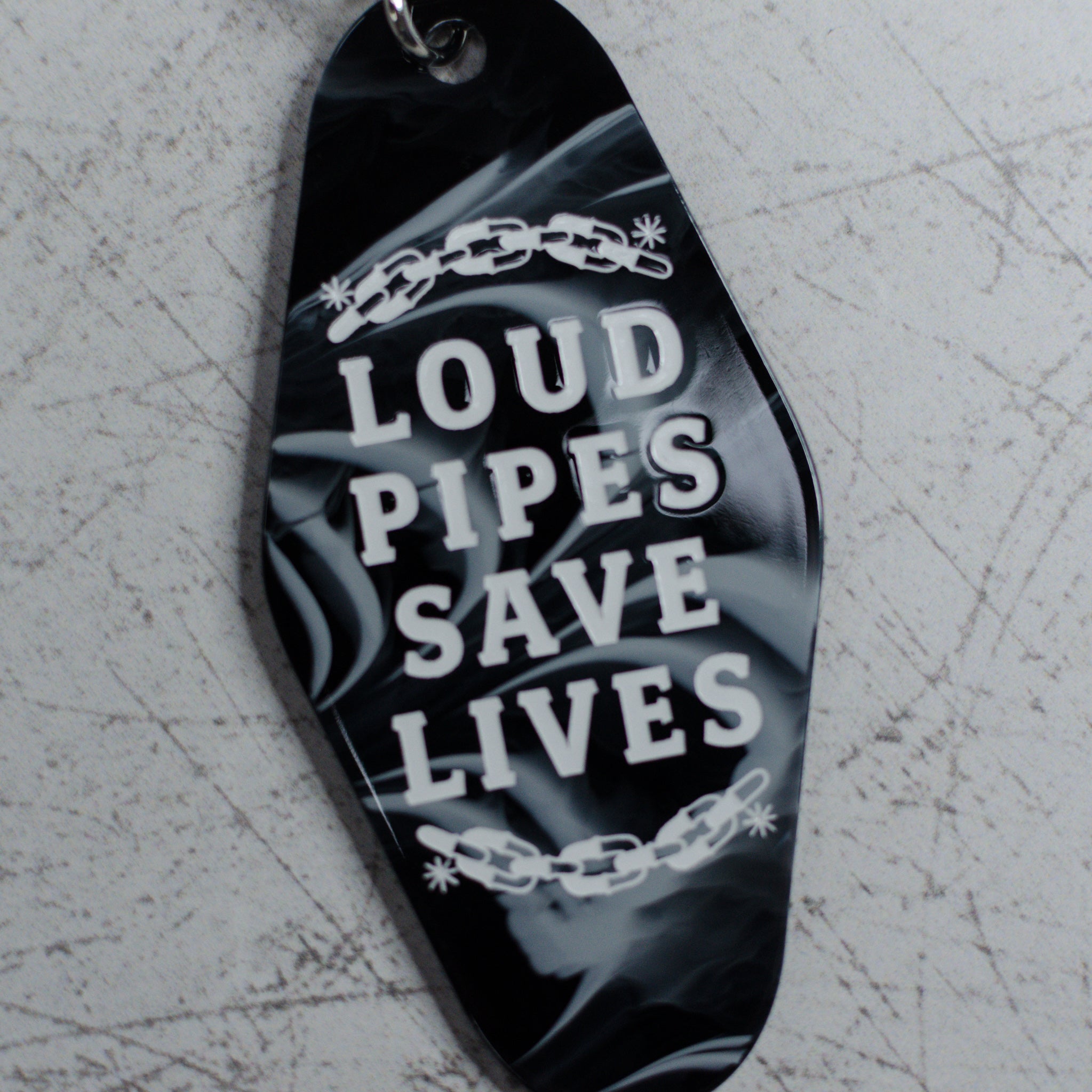 Loud Pipes Save Lives Motel Keychain Close Up