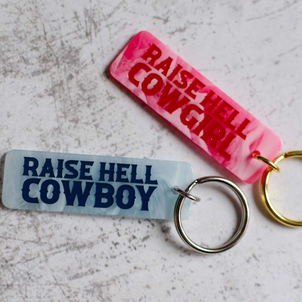 Raise Hell Cowgirl and Raise Hell Cowboy Keychains