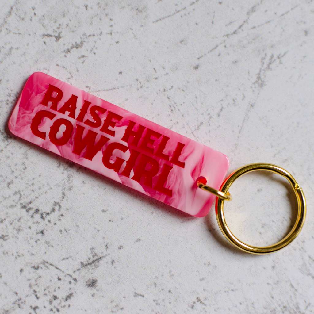 Raise Hell Cowgirl Pink Keychain Front View