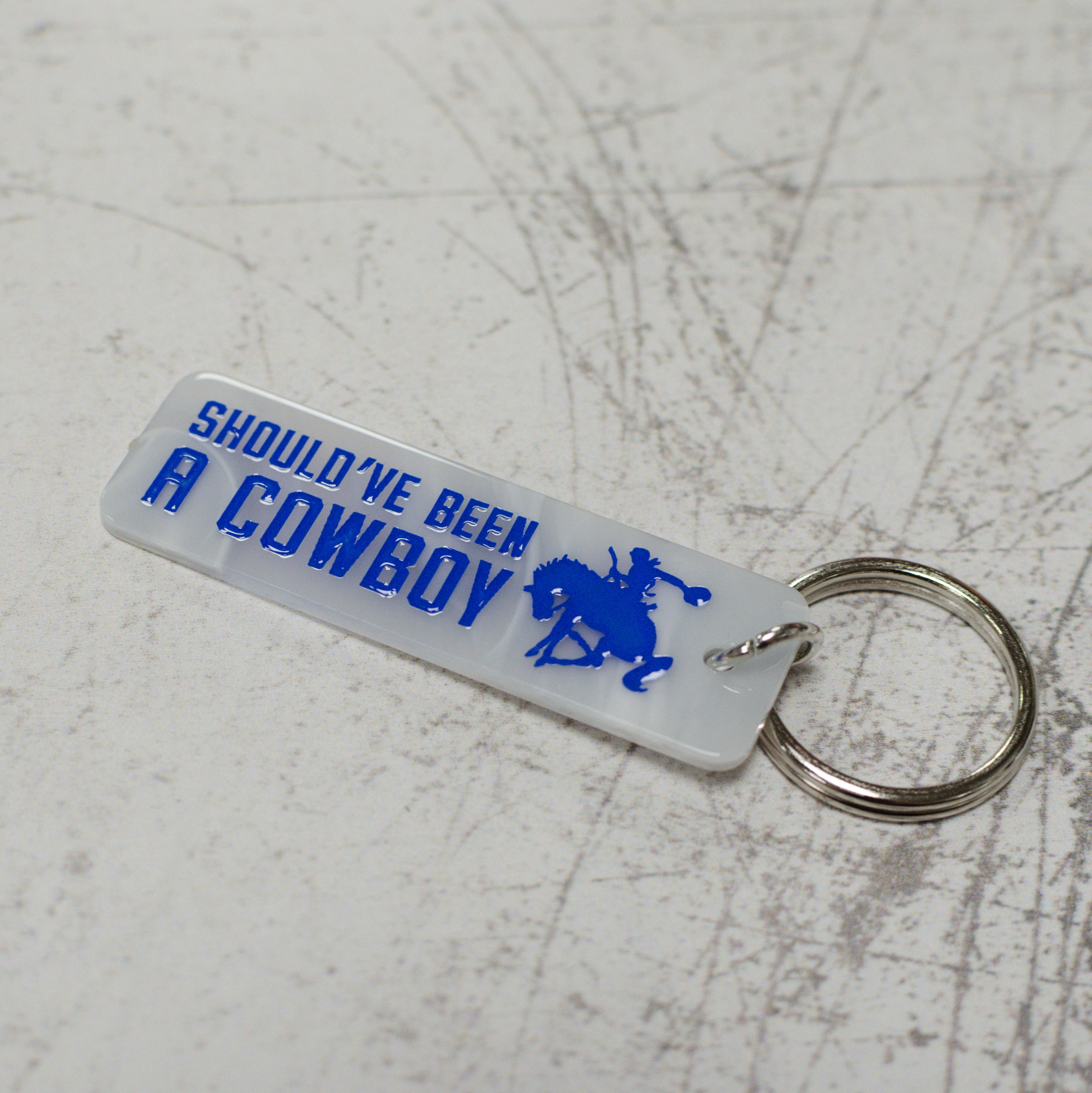 Should've Been A Cowboy Keychain Close Up View