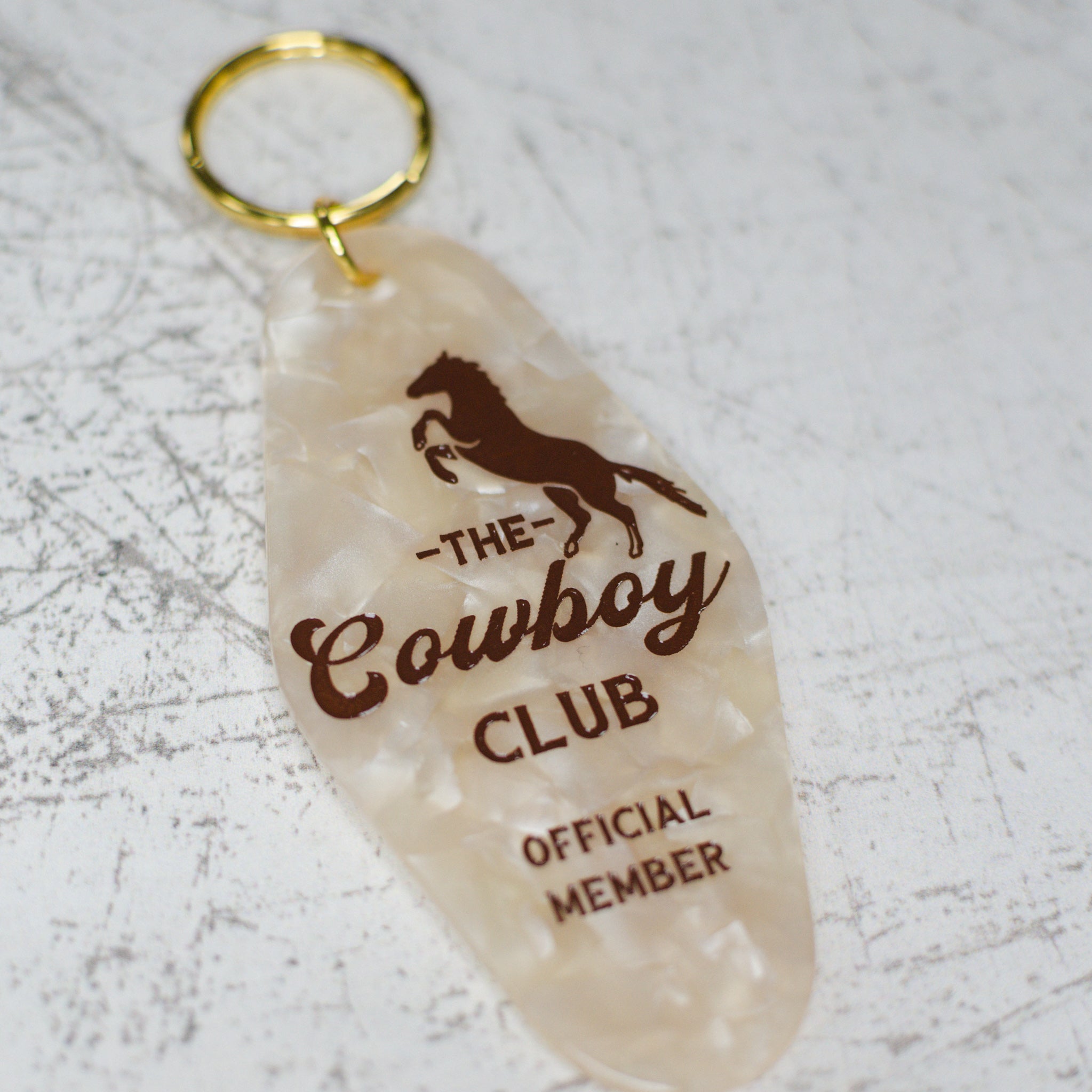 The Cowboy Club Official Member Motel Keychain Close Up