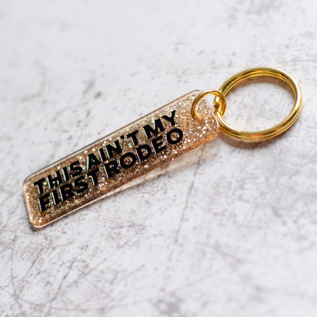 This Ain't My First Rodeo Sparkled Keychain Angled View