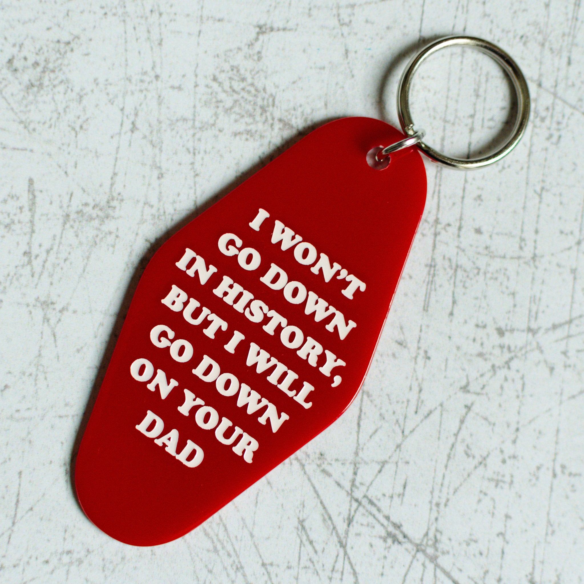 I Won't Go Down In History Motel Keychain Angled Front View