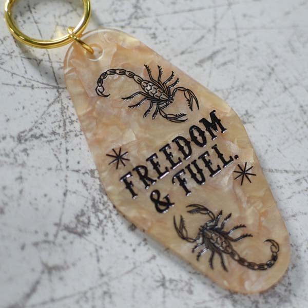 Freedom & Fuel Motel Style Keychain Close Up