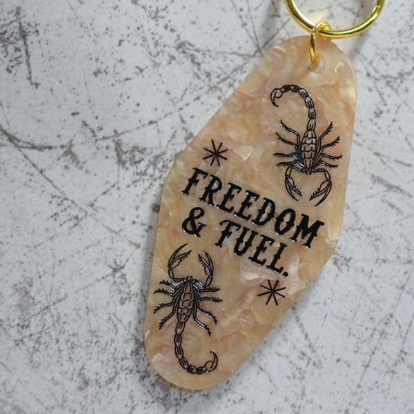Freedom & Fuel Motel Style Keychain Angled View