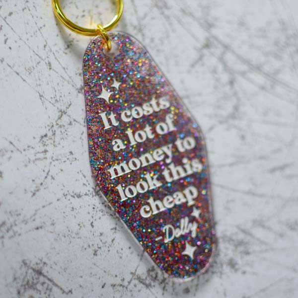 It Costs A Lot Of Money To Look This Cheap Motel Style Keychain Angled View