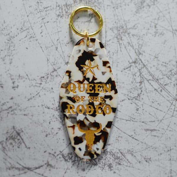 Queen Of The Rodeo Cow Print Motel Style Keychain Close Up