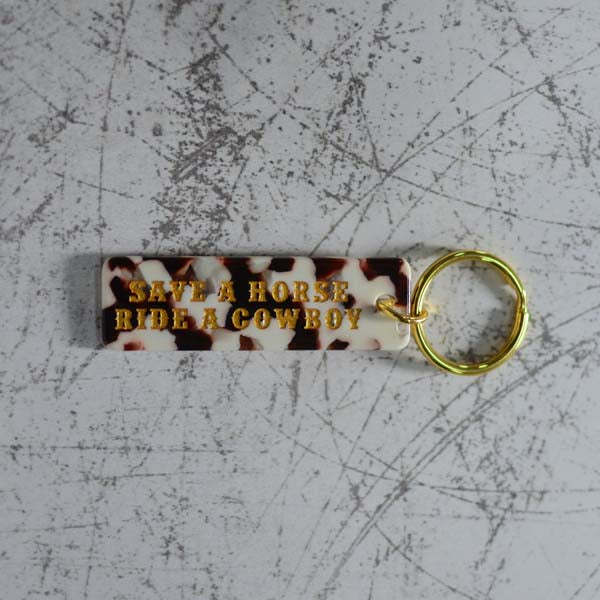Save A Horse Ride A Cowboy Cow Print Keychain