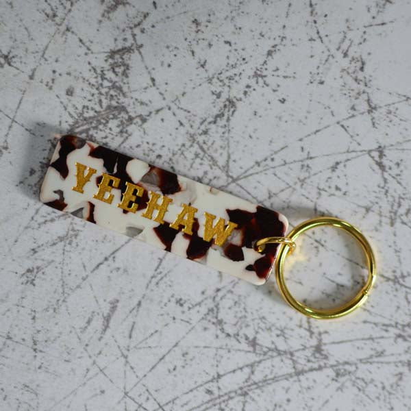 Yeehaw Cow Print Keychain Close Up