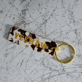 Yeehaw Cow Print Keychain Close Up