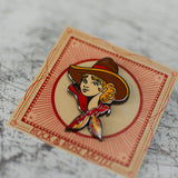 American Traditional Cowgirl Enamel Pin in Packaging Close Up View