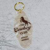 The Cowboy Club Official Member Motel Keychain Angled Front View