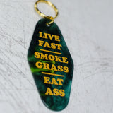Live Fast, Smoke Grass, Eat Ass Motel Keychain Close Up