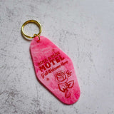 Pink Rock And Rose Motel Keychain With Rose Logo Front View