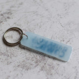 Raise Hell Cowboy Blue Keychain Back View