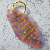 It's Hard To Be A Diamond In A Rhinestone World Motel Style Keychain Angled View